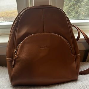 Woman’s purse/backpack 12”x 11”. With front and back pocket.